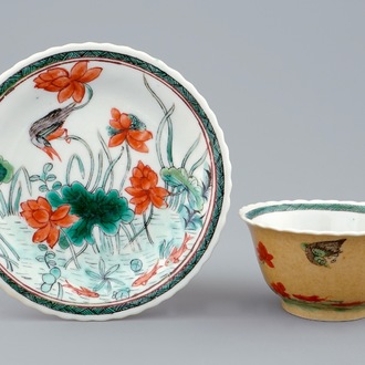 A Chinese famille verte and café au lait cup and saucer, Kangxi